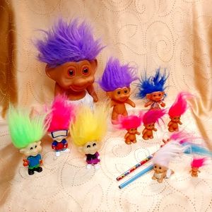 Thirteen TROLLS all for one price made by different manufacturers.